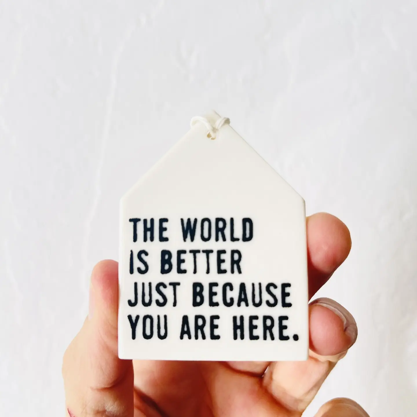 The World is Better Ceramic Wall Tag - Heart of the Home Inc