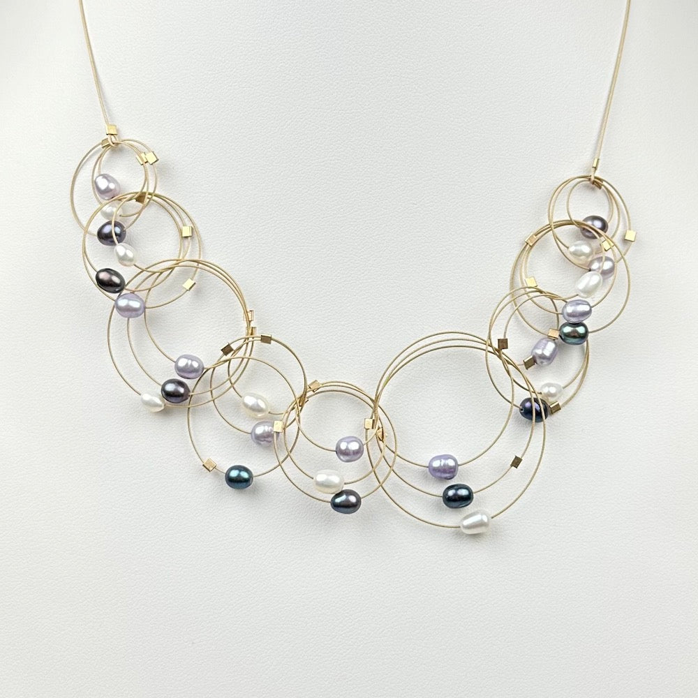 Vertigo Necklace in Gold with White & Gray Pearls | Heart of the