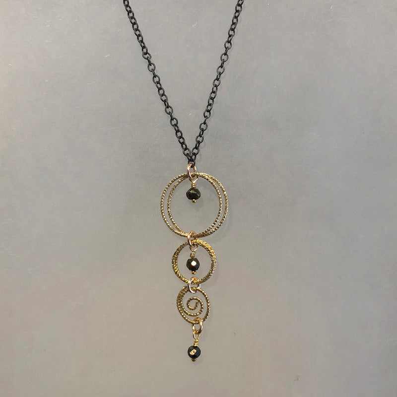 Linked Ring and Spiral Necklace - Heart of the Home PA